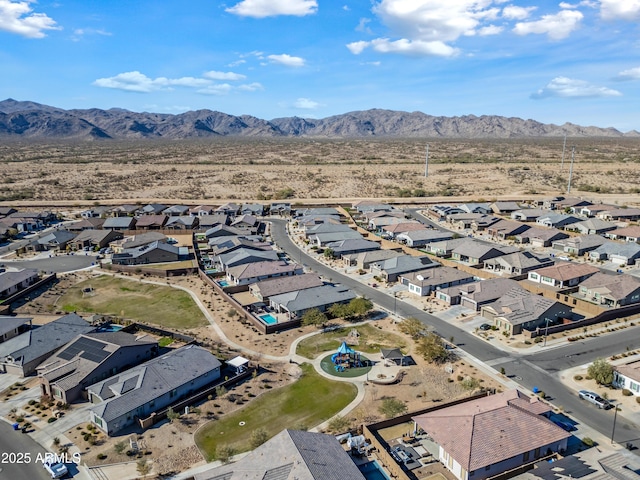 birds eye view of property featuring a mountain view