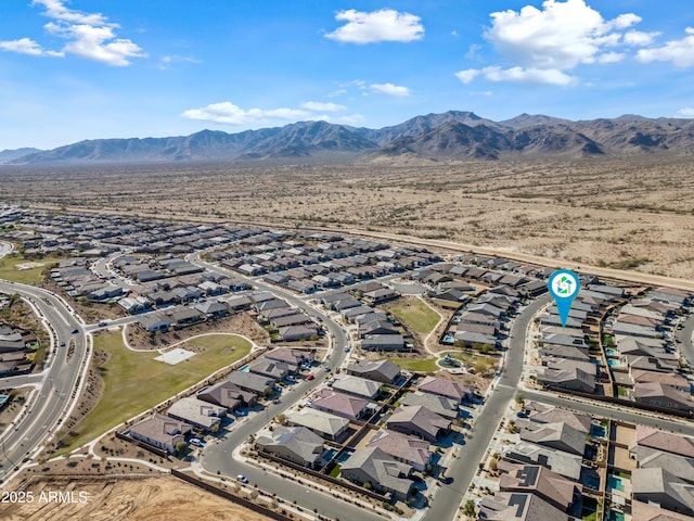 birds eye view of property featuring a mountain view