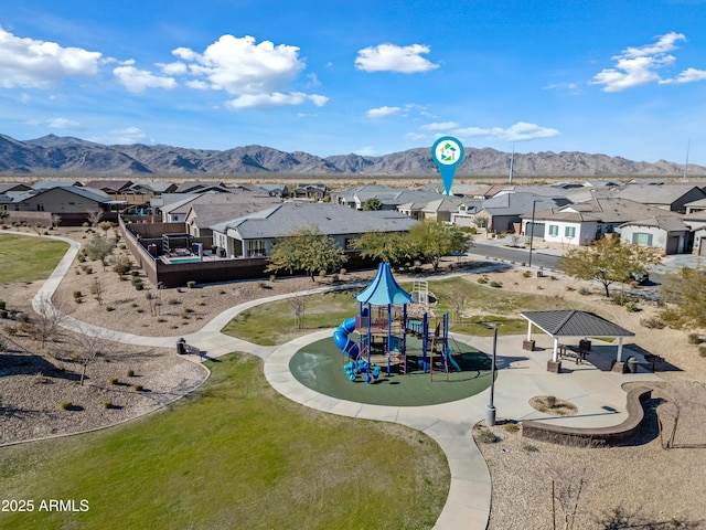 drone / aerial view featuring a mountain view