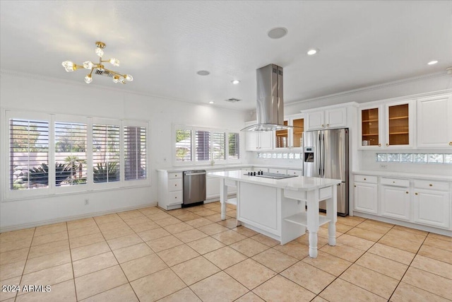 kitchen featuring white cabinets, a kitchen island, light tile patterned floors, stainless steel appliances, and island exhaust hood