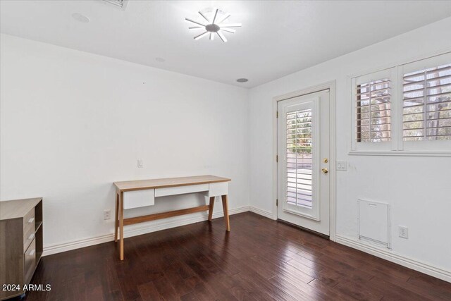 foyer featuring dark wood-type flooring