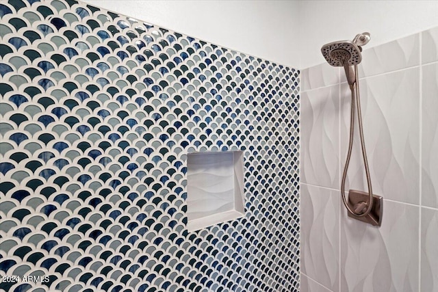 interior details featuring walk in shower