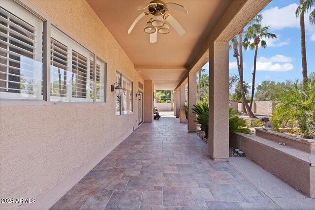 view of patio / terrace featuring ceiling fan