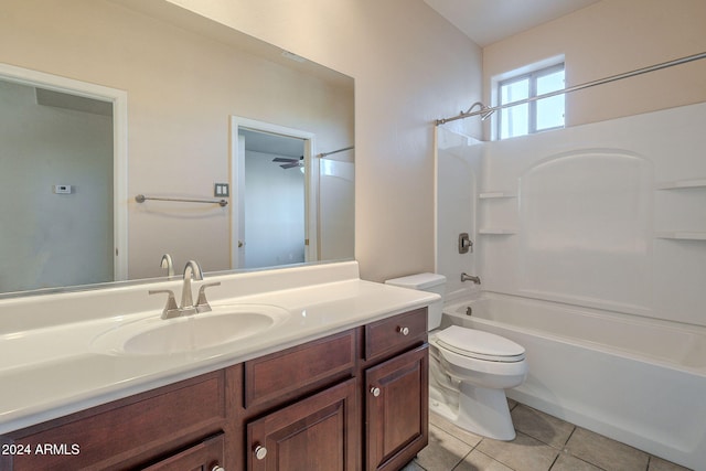 full bathroom featuring tile patterned floors, vanity, toilet, and bathing tub / shower combination