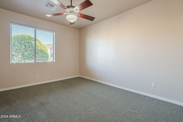 carpeted empty room with ceiling fan