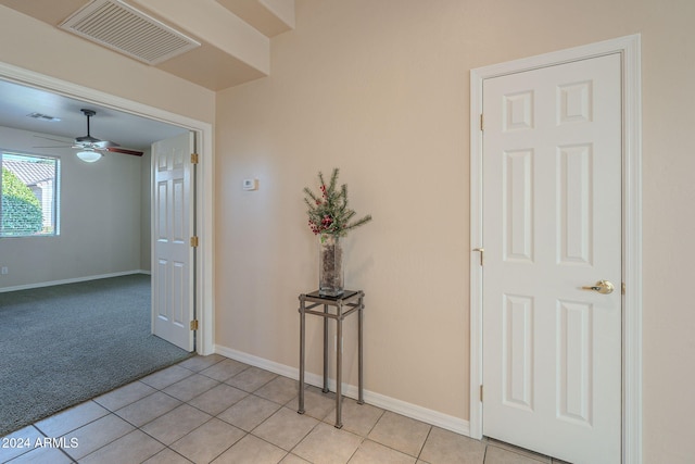 hallway with light tile patterned flooring