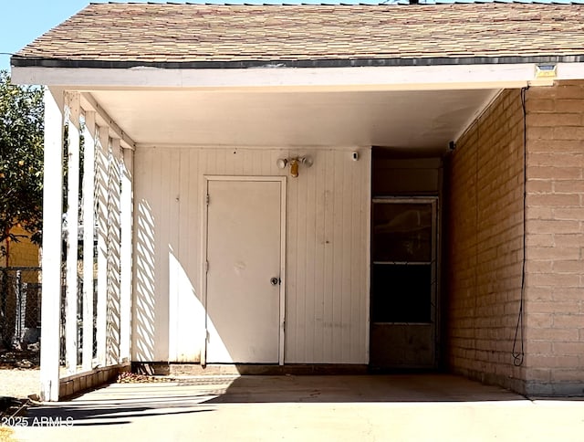 520 W Rocalla Ave, Ajo, AZ 85321 - property entrance with roof with shingles