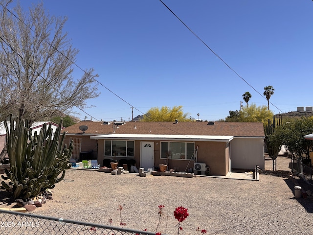 520 W Rocalla Ave, Ajo, AZ 85321 - rear view of house featuring a patio, stucco siding, and fence