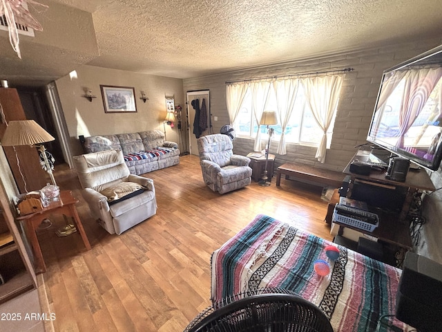 520 W Rocalla Ave, Ajo, AZ 85321 - living room with a textured ceiling and wood finished floors