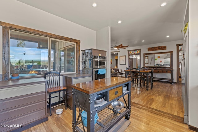 10975 E Janet Way, Dewey, AZ 86327 - dining space featuring light wood-type flooring, a ceiling fan, and recessed lighting