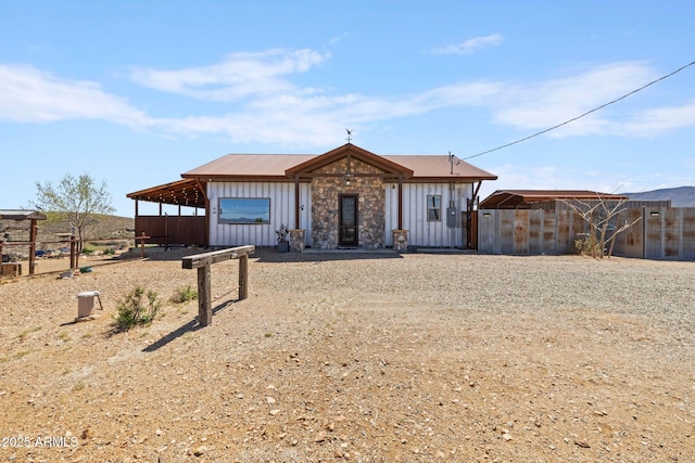 10975 E Janet Way, Dewey, AZ 86327 - view of front facade with board and batten siding and stone siding