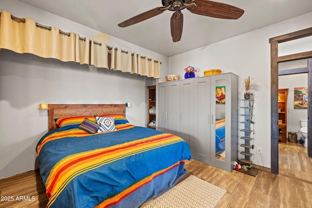 10975 E Janet Way, Dewey, AZ 86327 - bedroom with a ceiling fan and wood finished floors