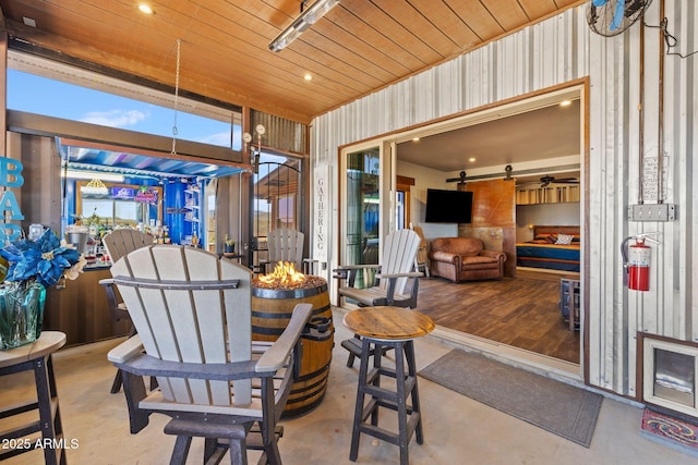 10975 E Janet Way, Dewey, AZ 86327 - view of patio / terrace with an outdoor fire pit