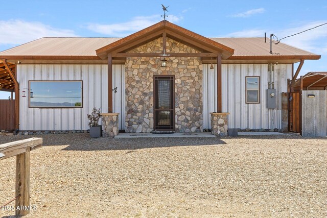 10975 E Janet Way, Dewey, AZ 86327 - ranch-style house featuring metal roof and stone siding