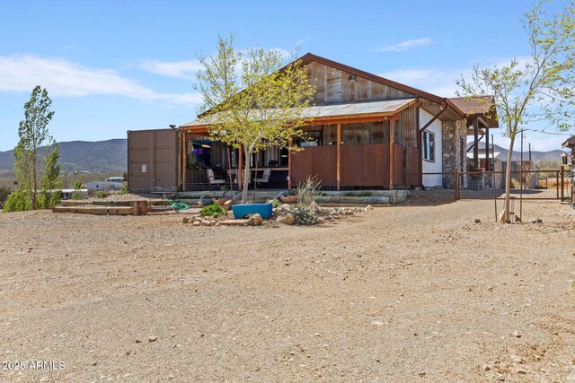 10975 E Janet Way, Dewey, AZ 86327 - rear view of house featuring a mountain view