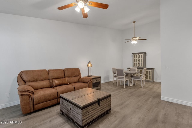 13636 N Hamilton Dr Unit 101, Fountain Hills, AZ 85268 - living room featuring baseboards, light wood-style flooring, and ceiling fan