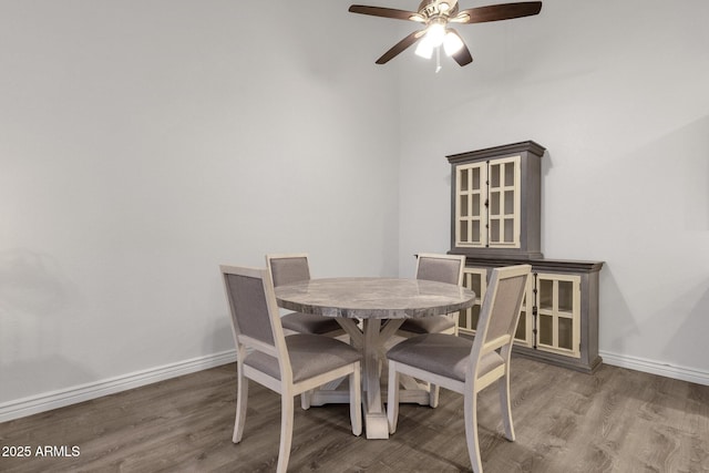 13636 N Hamilton Dr Unit 101, Fountain Hills, AZ 85268 - dining room featuring baseboards, a ceiling fan, and wood finished floors