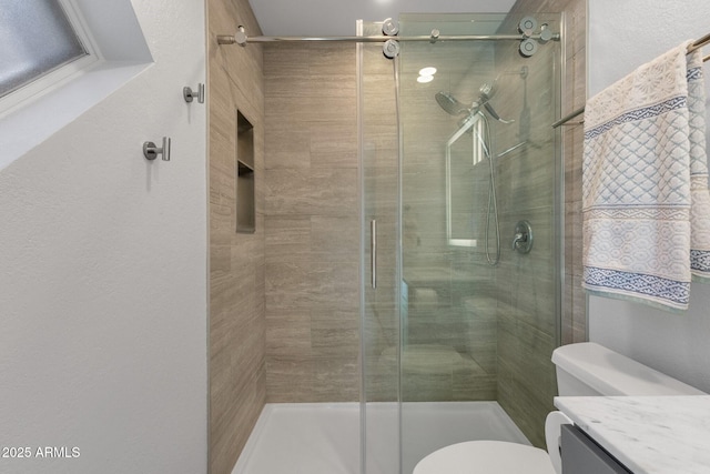 13636 N Hamilton Dr Unit 101, Fountain Hills, AZ 85268 - full bathroom featuring vanity, toilet, and a shower stall