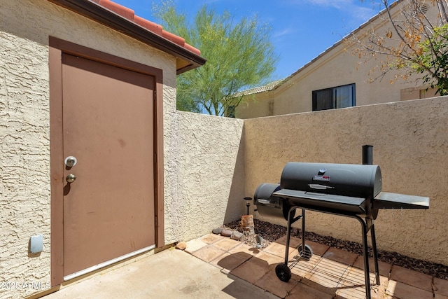 13636 N Hamilton Dr Unit 101, Fountain Hills, AZ 85268 - view of patio / terrace with fence and area for grilling