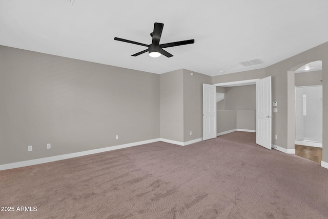 3376 E Lafayette Ave, Gilbert, AZ 85298 - unfurnished living room with arched walkways, ceiling fan, and carpet flooring