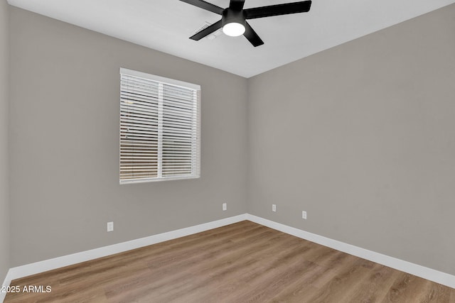 3376 E Lafayette Ave, Gilbert, AZ 85298 - unfurnished room with wood finished floors and ceiling fan