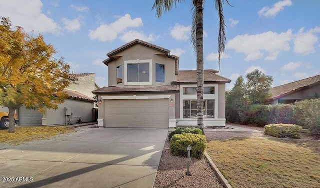 1345 E Betsy Ln, Gilbert, AZ 85296 - view of front of house with a garage, stucco siding, concrete driveway, and a tile roof