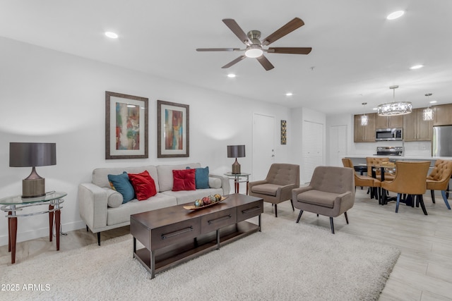 7777 E Main St Unit 215, Scottsdale, AZ 85251 - living room featuring recessed lighting and a ceiling fan