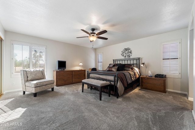 bedroom with ceiling fan and carpet flooring