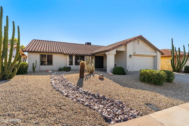 view of front of home with a garage