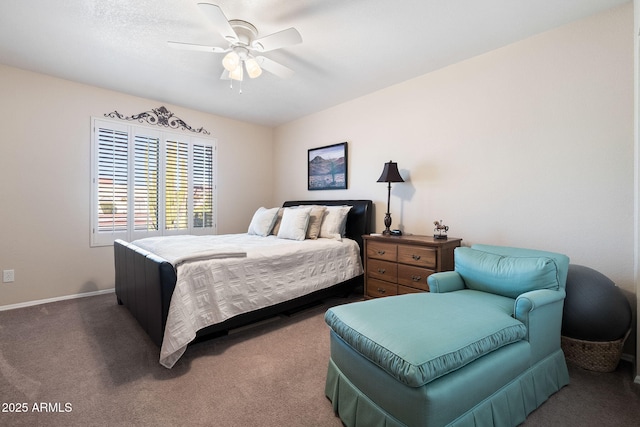 bedroom featuring ceiling fan and carpet