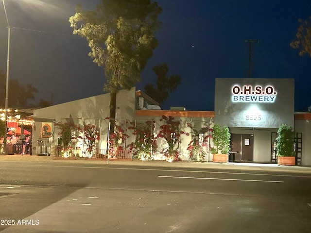 view of property at twilight