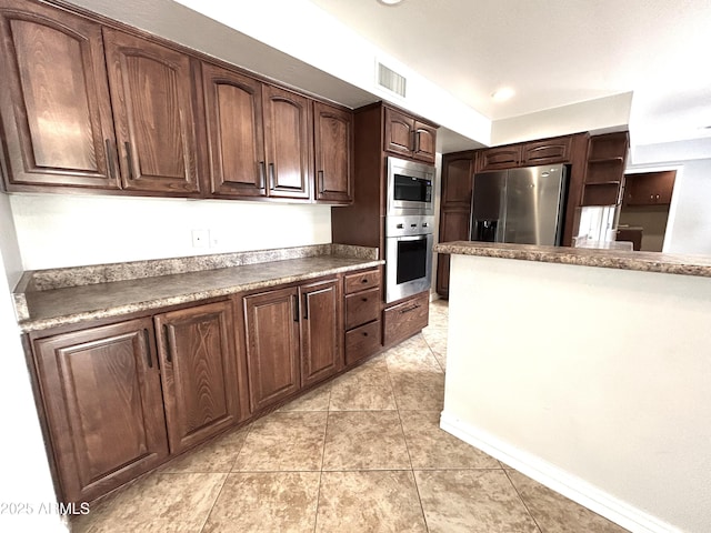 kitchen featuring open shelves, visible vents, light tile patterned flooring, dark brown cabinetry, and appliances with stainless steel finishes
