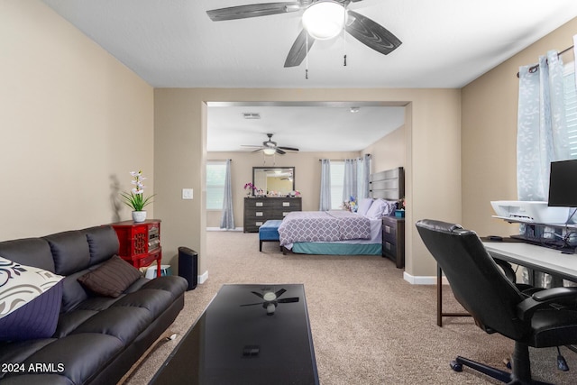 bedroom featuring carpet floors, baseboards, ceiling fan, and visible vents