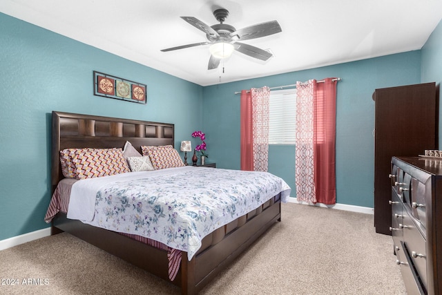 bedroom featuring carpet floors, baseboards, and ceiling fan