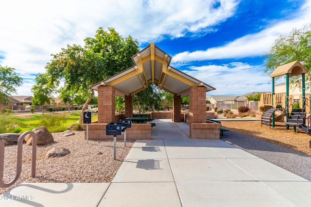 surrounding community with a patio, a gazebo, and playground community