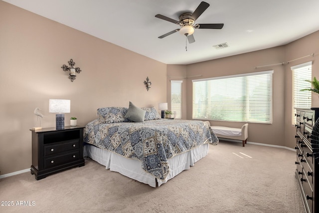 bedroom with ceiling fan and carpet