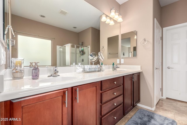 bathroom featuring vanity, tile patterned flooring, and walk in shower