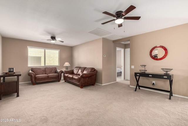 living room with ceiling fan and light carpet