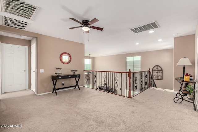 hallway featuring carpet flooring