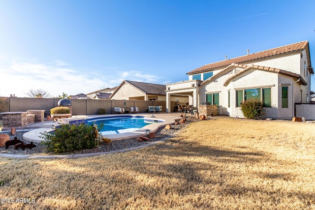 view of pool featuring a yard and a patio area