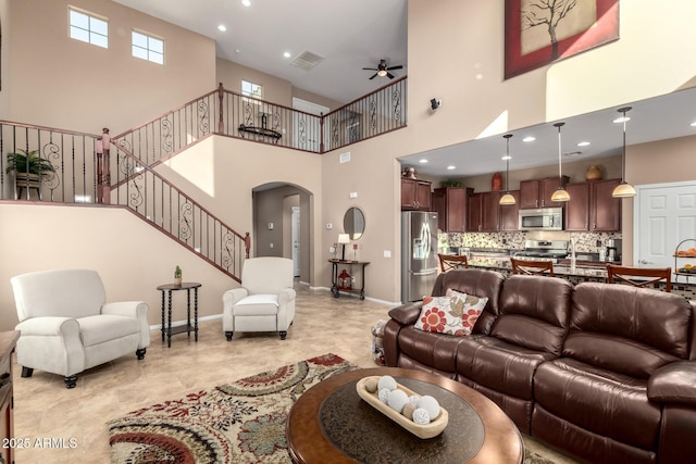 living room featuring ceiling fan