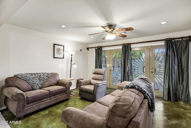 living room featuring ceiling fan and french doors