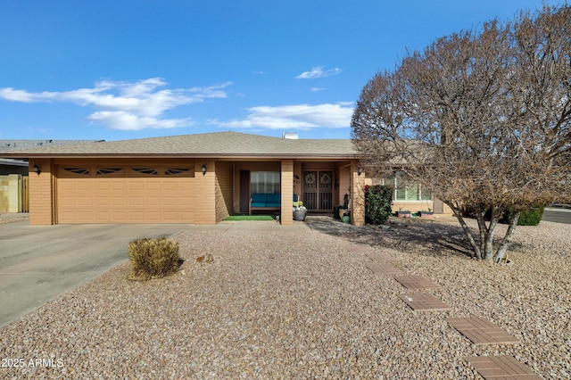 ranch-style home with a garage