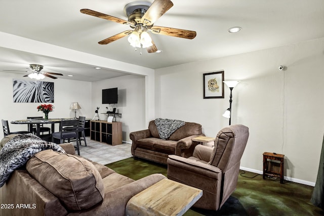 living room featuring ceiling fan