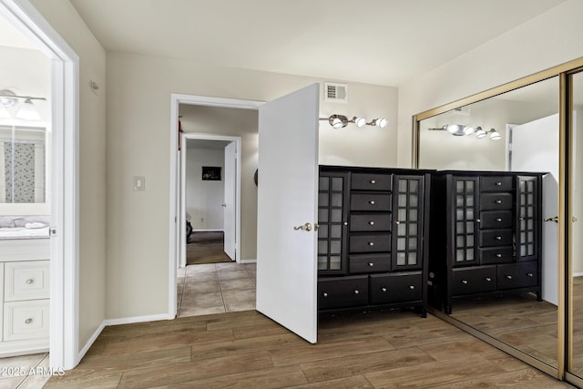 bathroom with vanity, mail boxes, and wood-type flooring