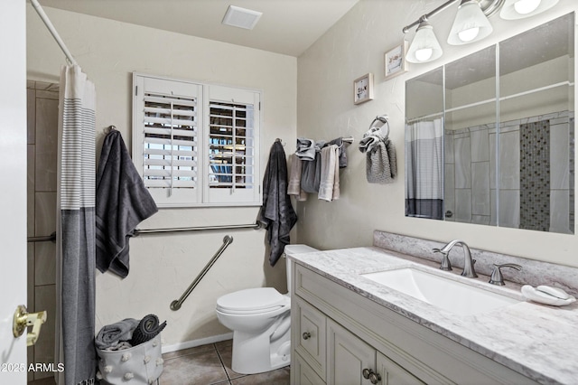 bathroom featuring vanity, curtained shower, tile patterned floors, and toilet