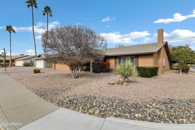 single story home featuring a garage