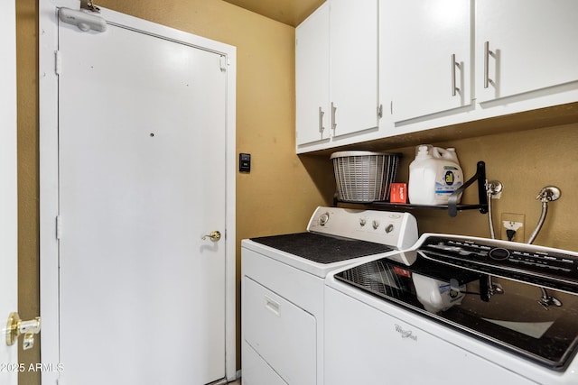 laundry area featuring cabinets and independent washer and dryer