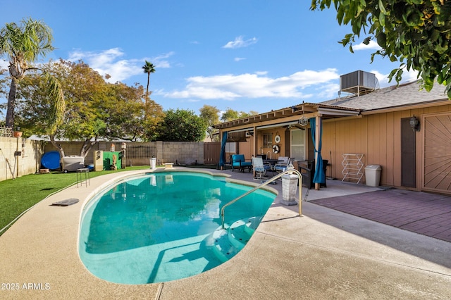 view of swimming pool featuring central AC and a patio area