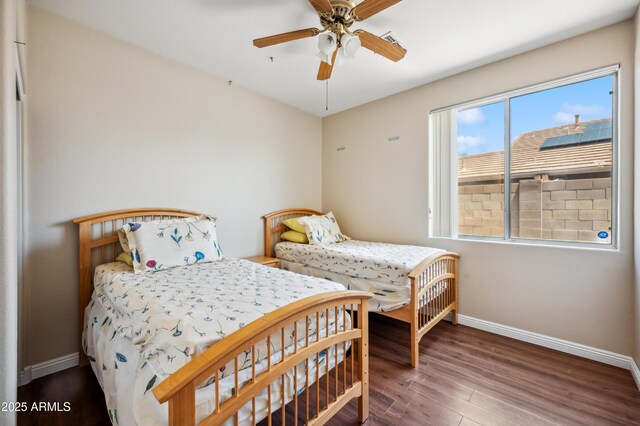 3905 S Bridal Vail Dr, Gilbert, AZ 85297 - bedroom featuring baseboards, wood finished floors, and a ceiling fan